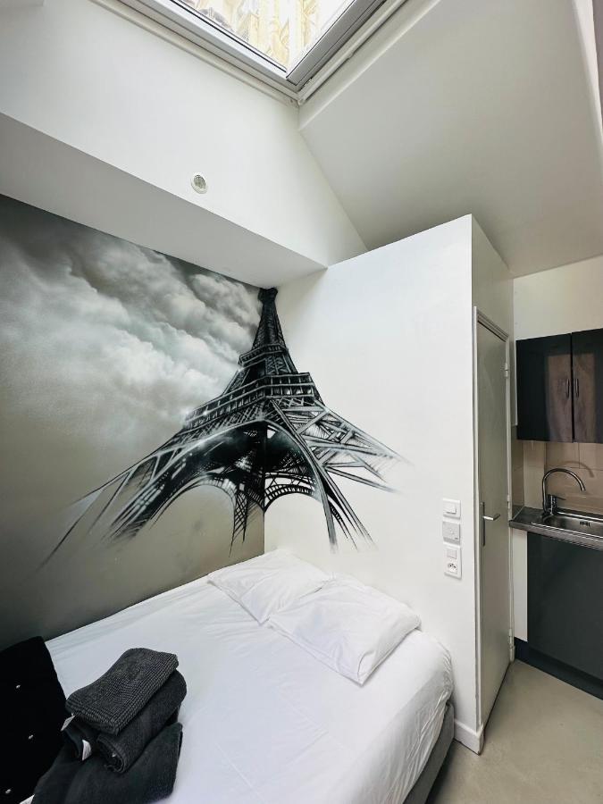 Aparthotel Beatrice et Emmanuel Meublé Eiffel à Paris Chambre photo